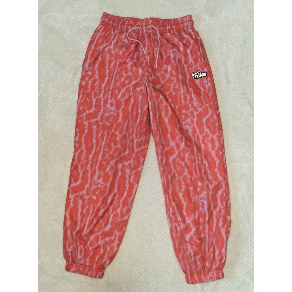 ​Nike Womens Sportswear Woven Pants Size S Orange Animal Print Track Jogger